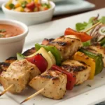 Delicious Chicken Kebabs served with salad